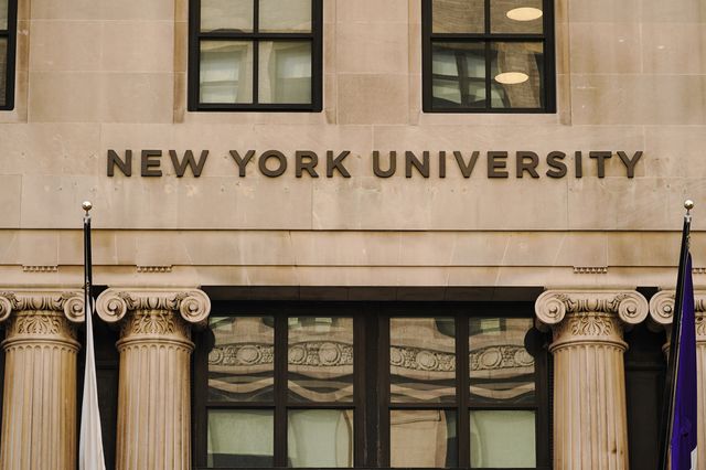 An NYU sign on one of the university's buildings.